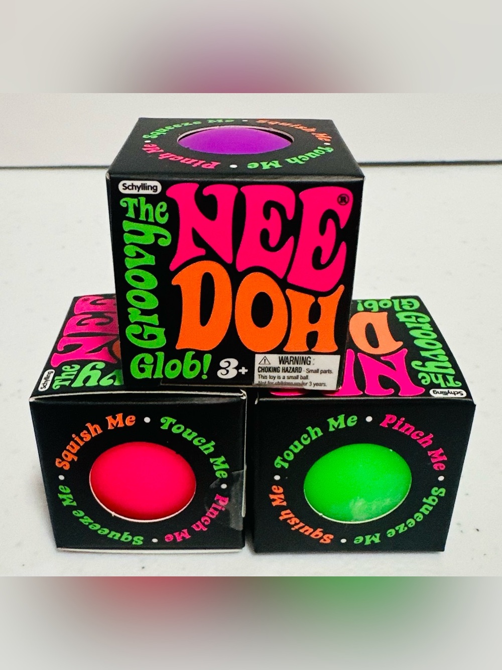 Nee Doh Groovy Glob Sensory Squishy Toy โ Set of Three Pink, Purple, and Green